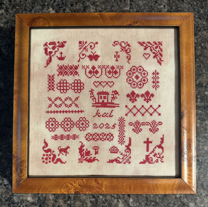 A Home for Henrietta original sampler design by Cross Stitch Antiques